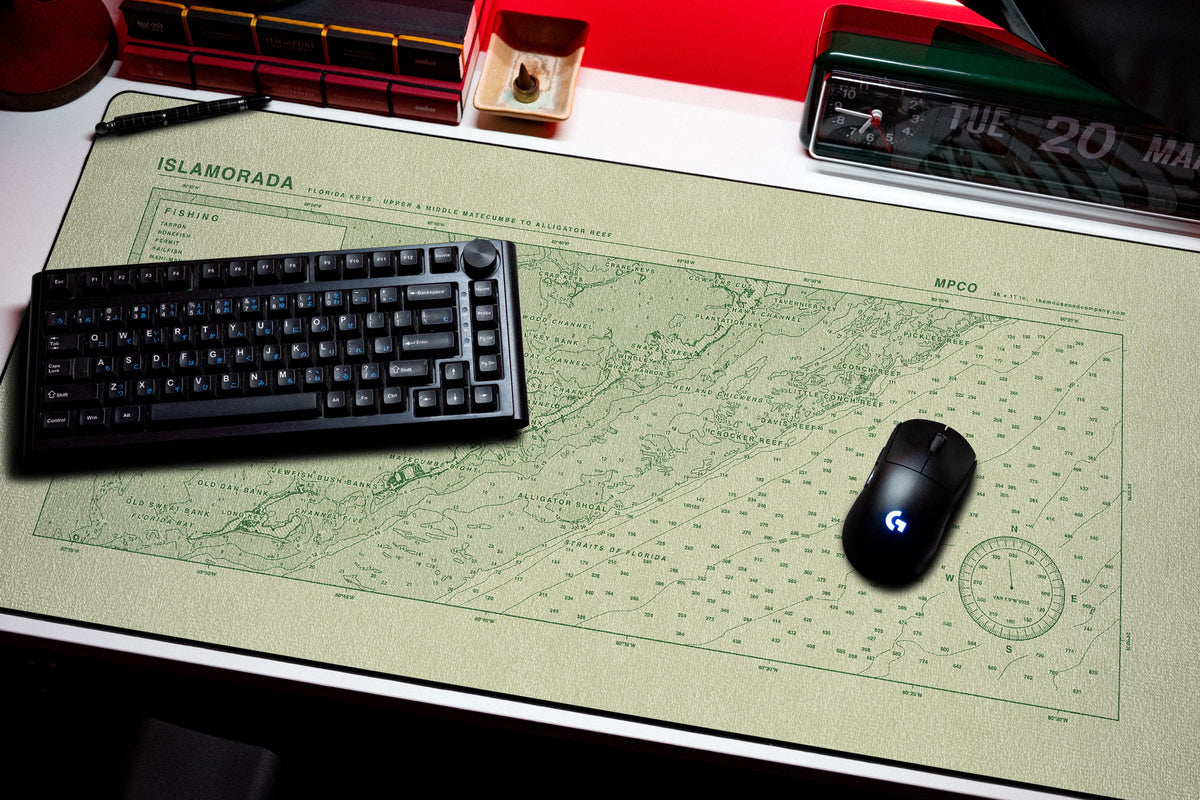 Islamorada Nautical Chart Pad desk mat in Buff / Green, shown on a styled desk setup