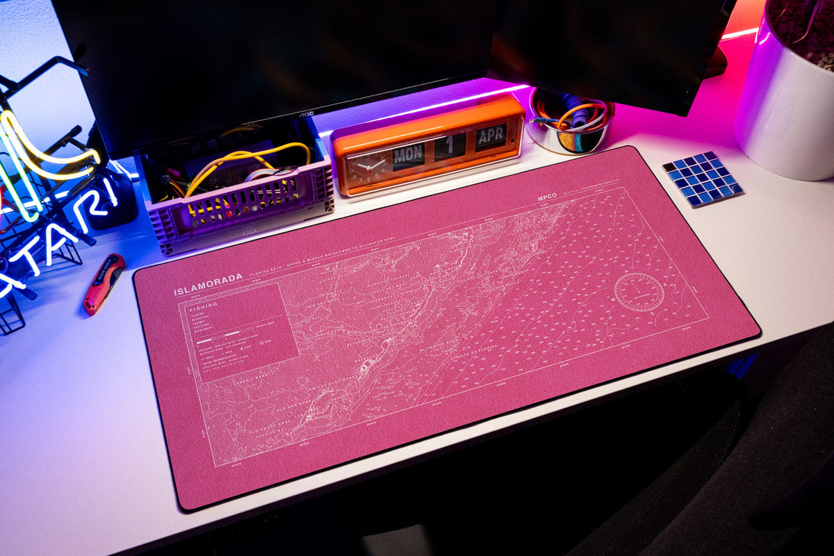 Islamorada Nautical Chart Pad desk mat in Pink / White, shown on a styled desk setup