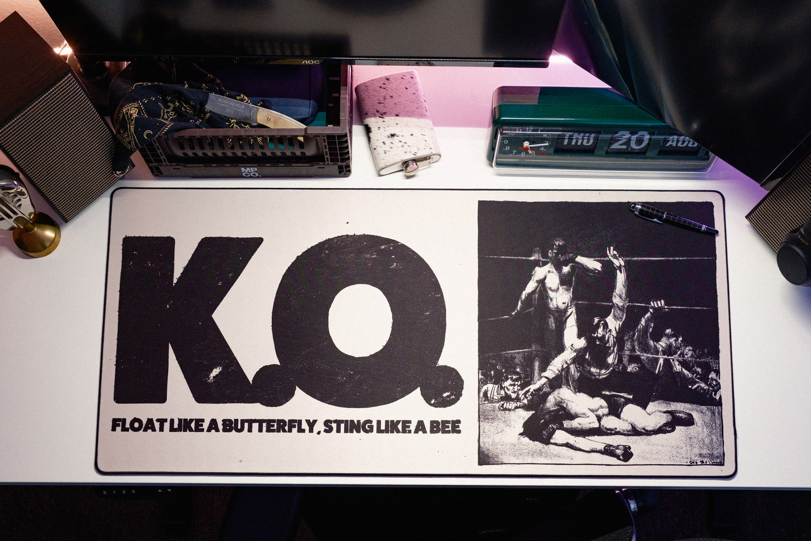 K.O. desk mat in Original, shown on a styled desk setup