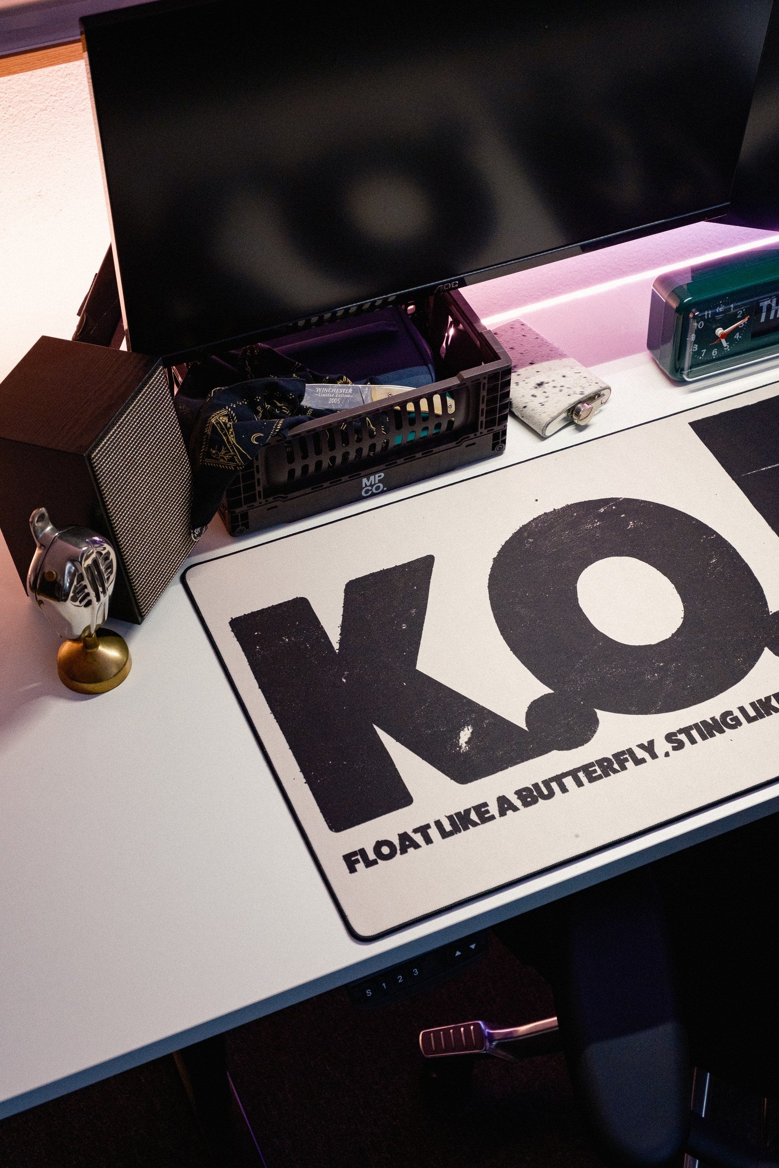 K.O. desk mat in Original, shown on a styled desk setup