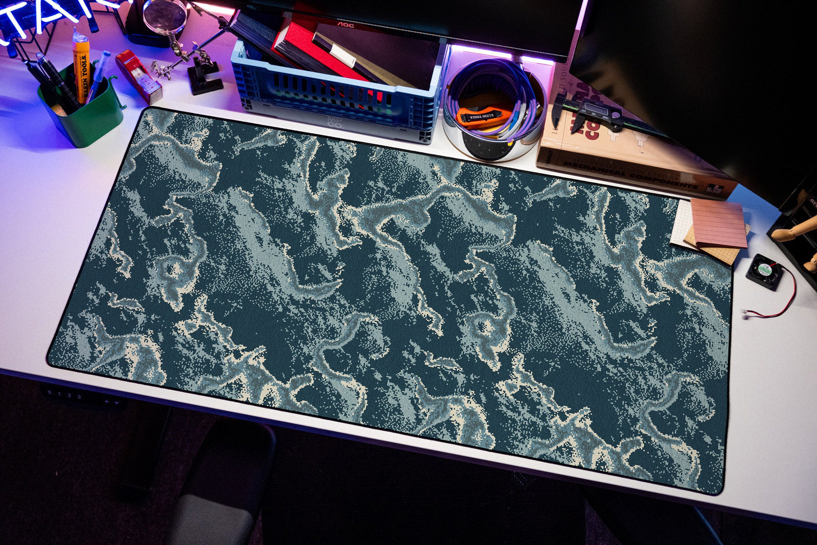 Koi desk mat in Steel, shown on a styled desk setup