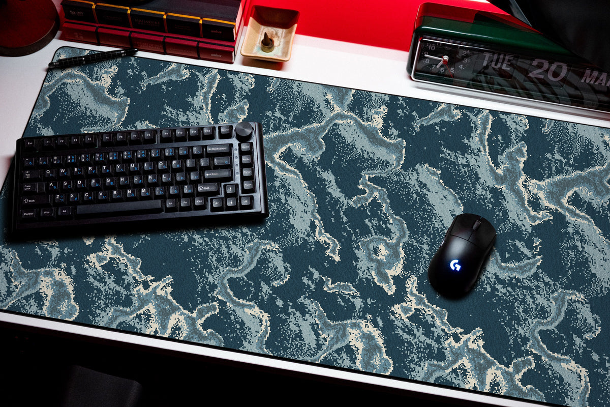 Koi desk mat in Steel, shown on a styled desk setup