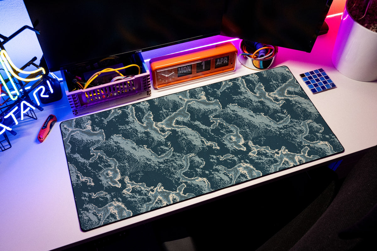 Koi desk mat in Steel, shown on a styled desk setup