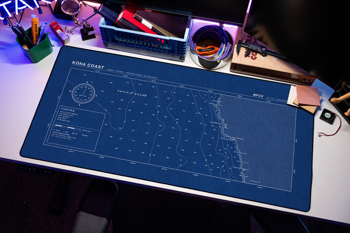 Kona Coast Nautical Chart Pad desk mat in Blue / White, shown on a styled desk setup