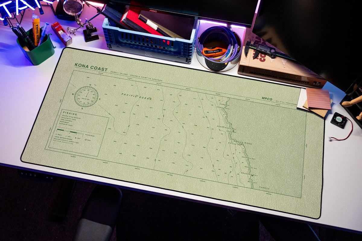 Kona Coast Nautical Chart Pad desk mat in Buff / Green, shown on a styled desk setup