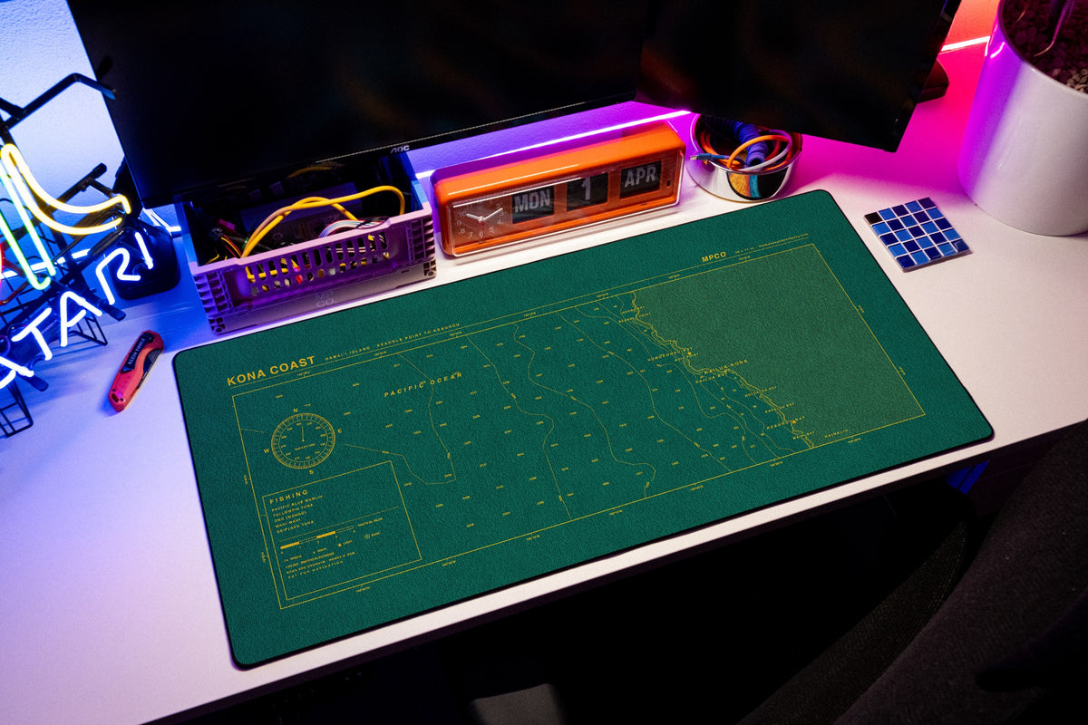 Kona Coast Nautical Chart Pad desk mat in Green / Yellow, shown on a styled desk setup