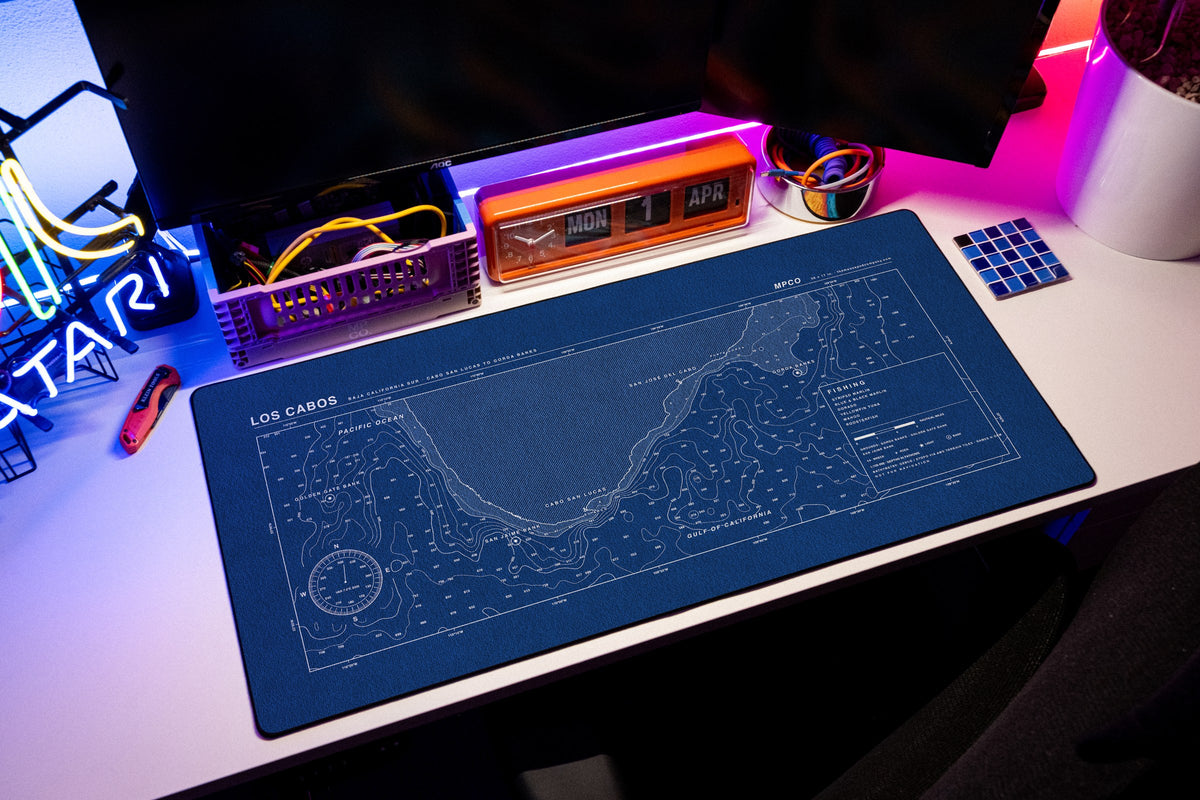 Los Cabos Nautical Chart Pad desk mat in Blue / White, shown on a styled desk setup