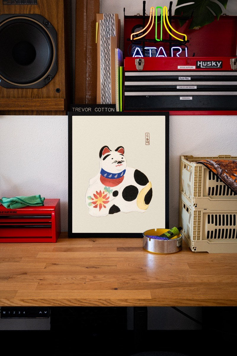 Maneki-Neko Hariko Cat - Japanese Folk Art art print styled in a room setting
