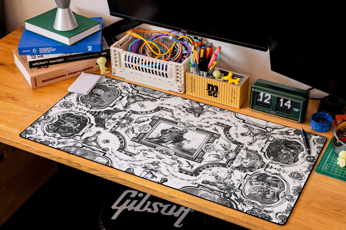 Martelli Hall desk mat in Dither, shown on a styled desk setup