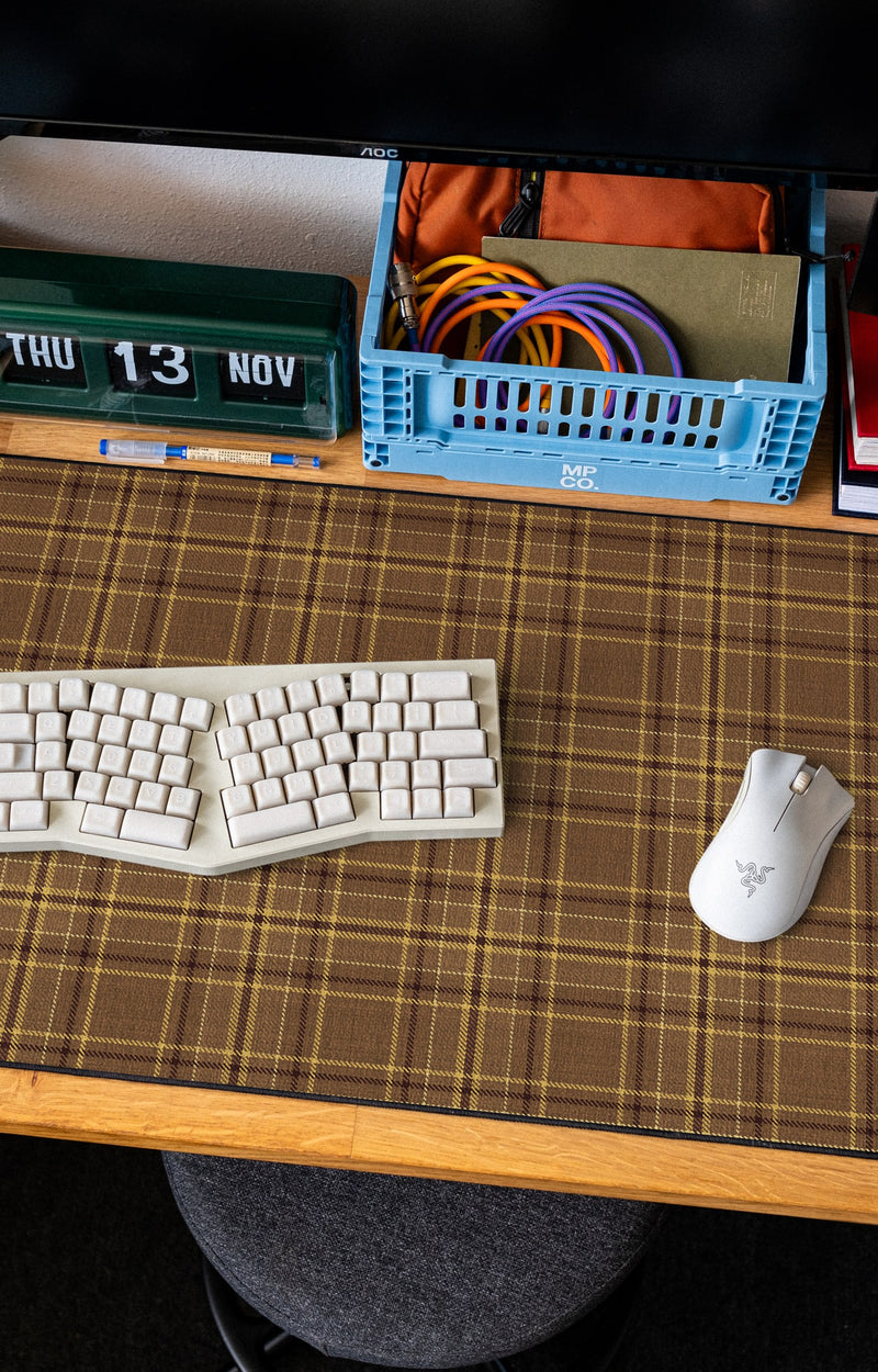 Flannel Plaids desk mat in Caramel on a cozy desk