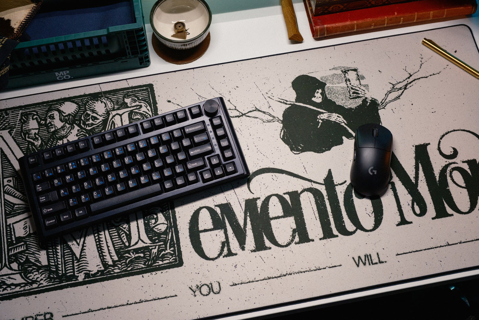 Memento Mori desk mat in Original, shown on a styled desk setup