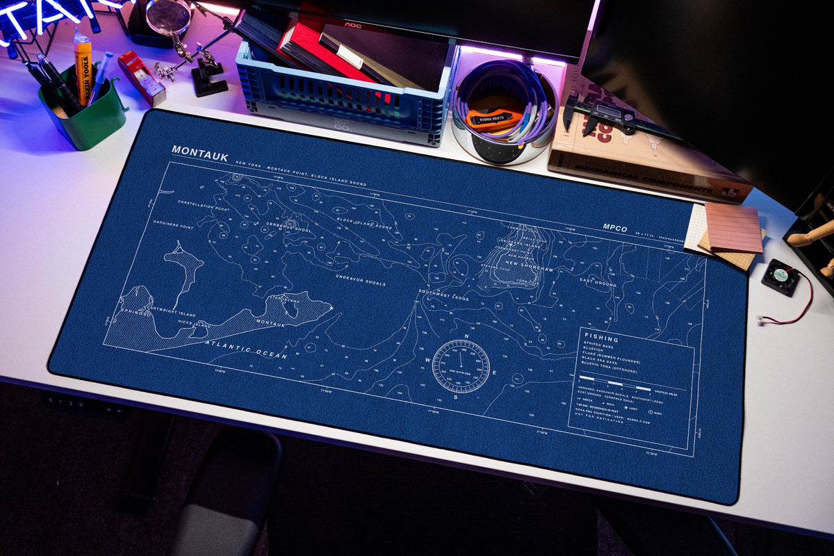 Montauk Nautical Chart Pad desk mat in Blue / White, shown on a styled desk setup