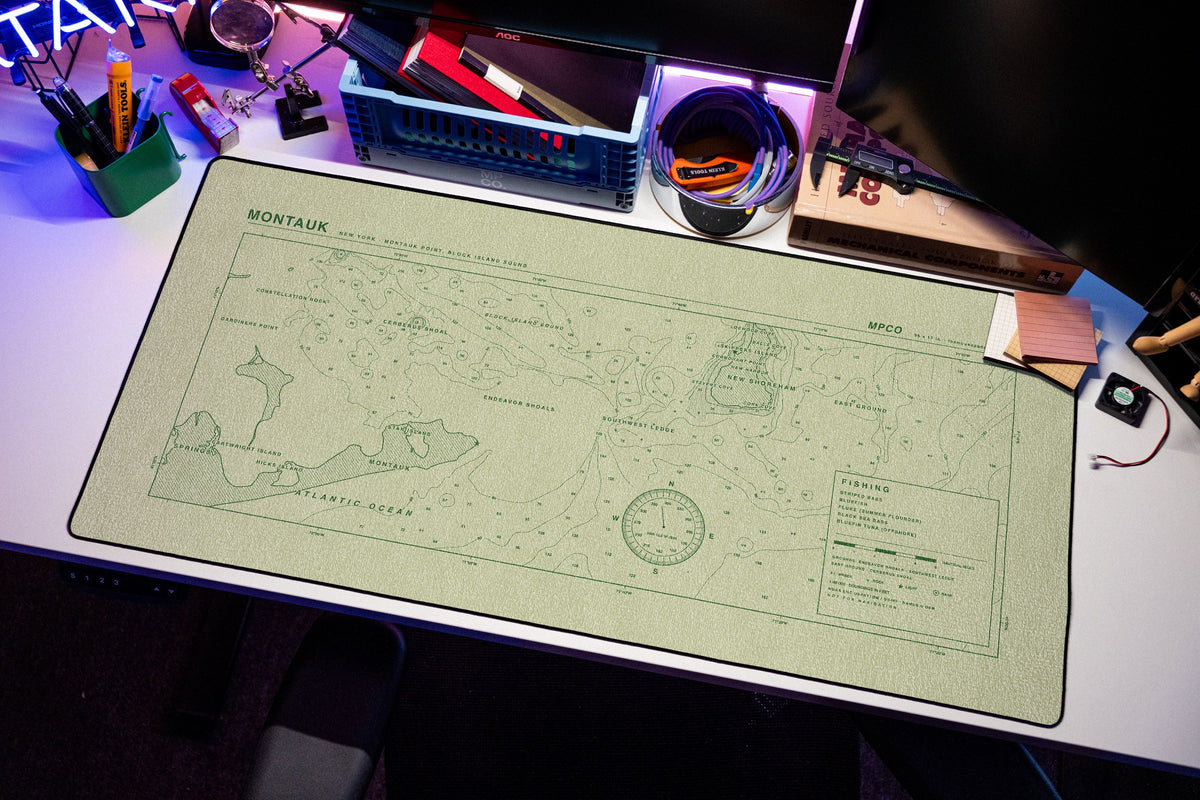 Montauk Nautical Chart Pad desk mat in Buff / Green, shown on a styled desk setup