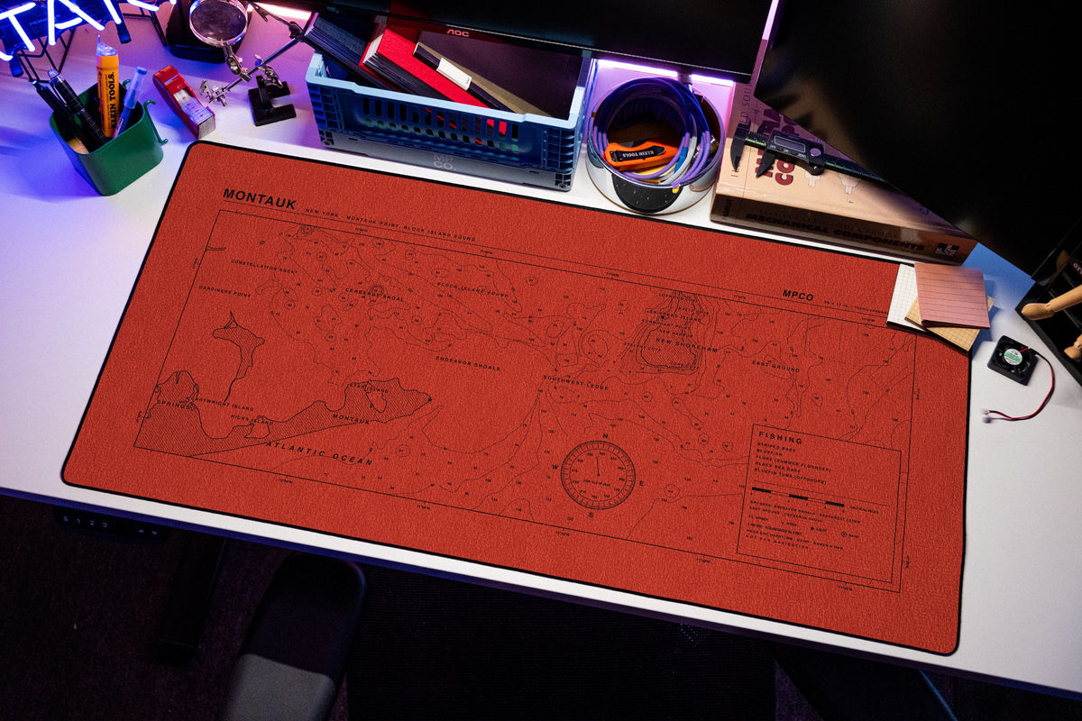 Montauk Nautical Chart Pad desk mat in Red / Black, shown on a styled desk setup