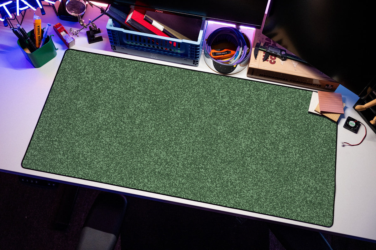 Mycel desk mat in Green, shown on a styled desk setup