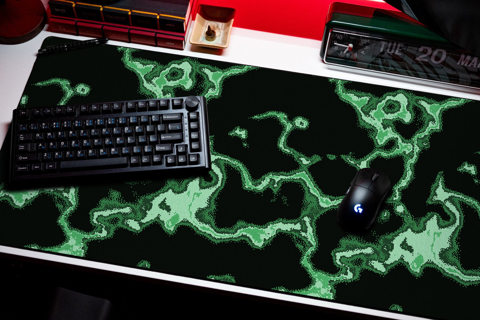 Neon desk mat in Green, shown on a styled desk setup