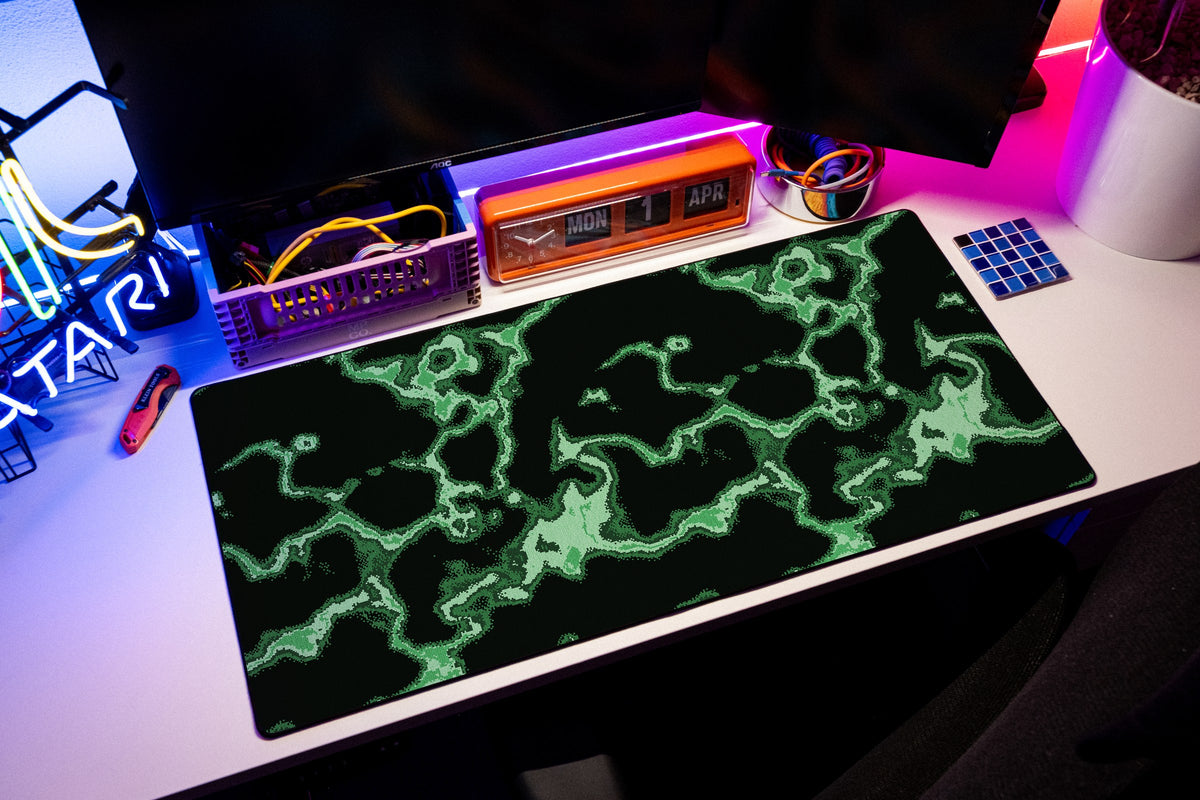 Neon desk mat in Green, shown on a styled desk setup