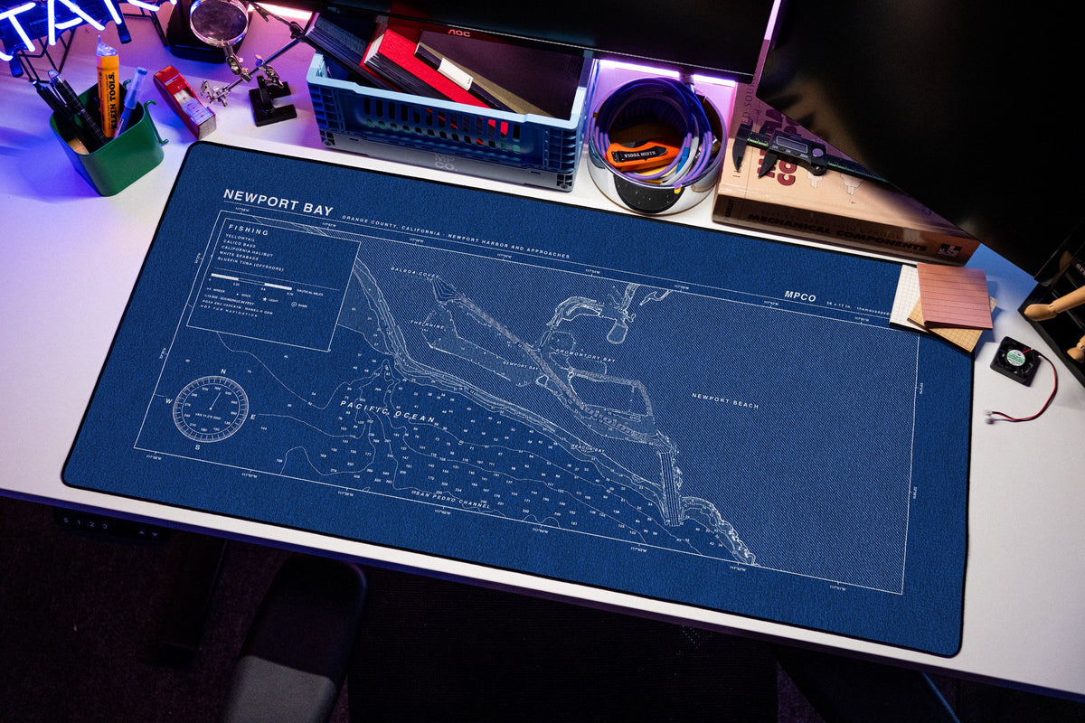 Newport Bay Nautical Chart Pad desk mat in Blue / White, shown on a styled desk setup