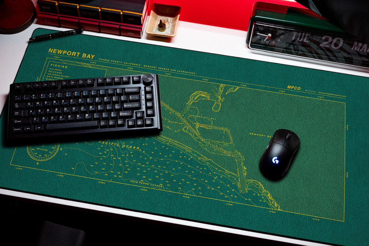 Newport Bay Nautical Chart Pad desk mat in Green / Yellow, shown on a styled desk setup