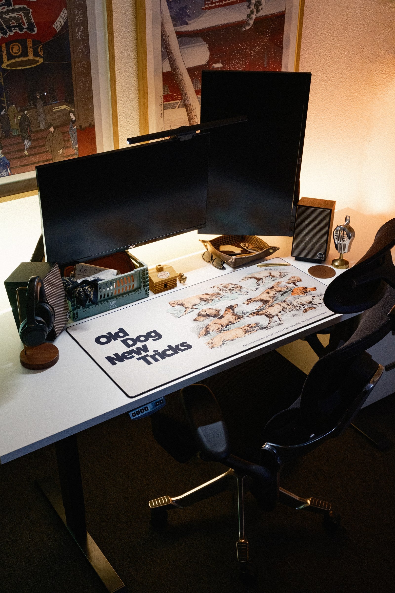 Old Dog New Tricks desk mat in Original, shown on a styled desk setup