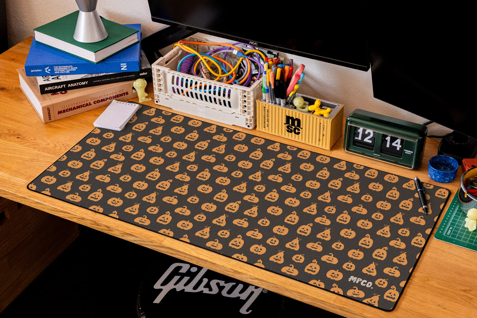 Pumpkin Patch desk mat in Black, shown on a styled desk setup