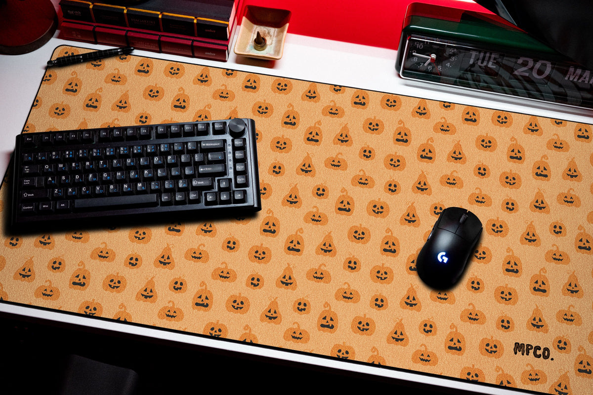 Pumpkin Patch desk mat in Orange, shown on a styled desk setup