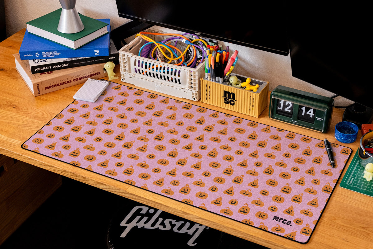 Pumpkin Patch desk mat in Pink, shown on a styled desk setup