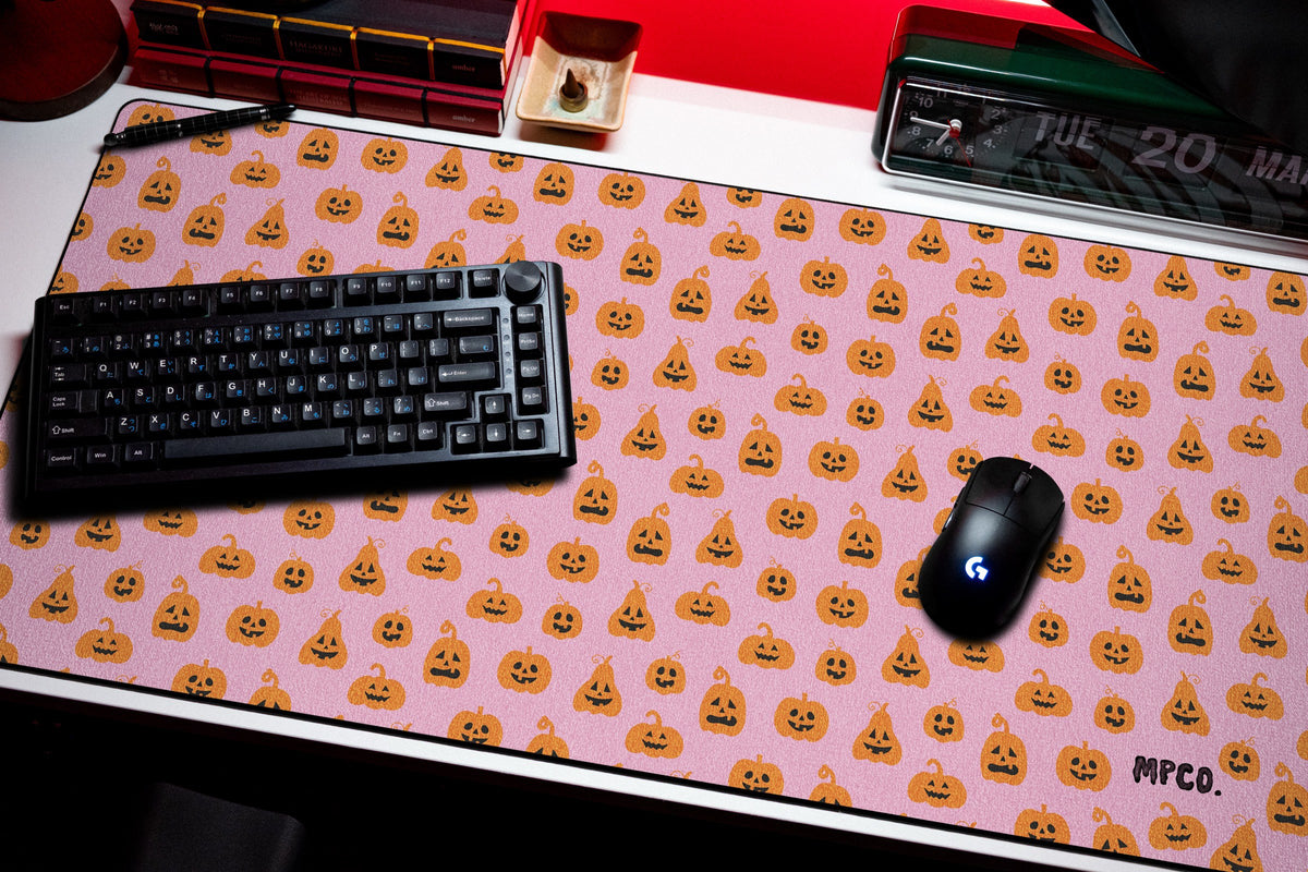Pumpkin Patch desk mat in Pink, shown on a styled desk setup