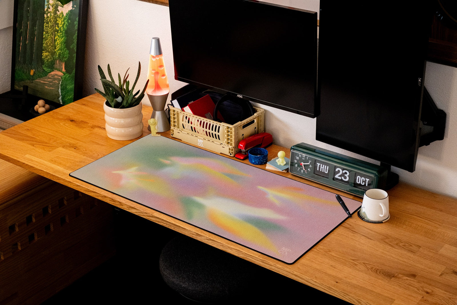 Rainbow Sherbet desk mat in Original, shown on a styled desk setup