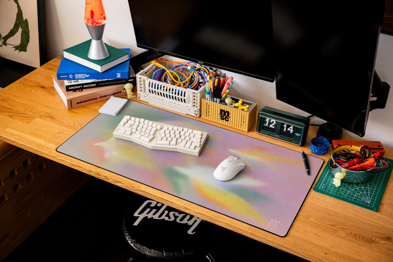 Rainbow Sherbet desk mat in Original, shown on a styled desk setup