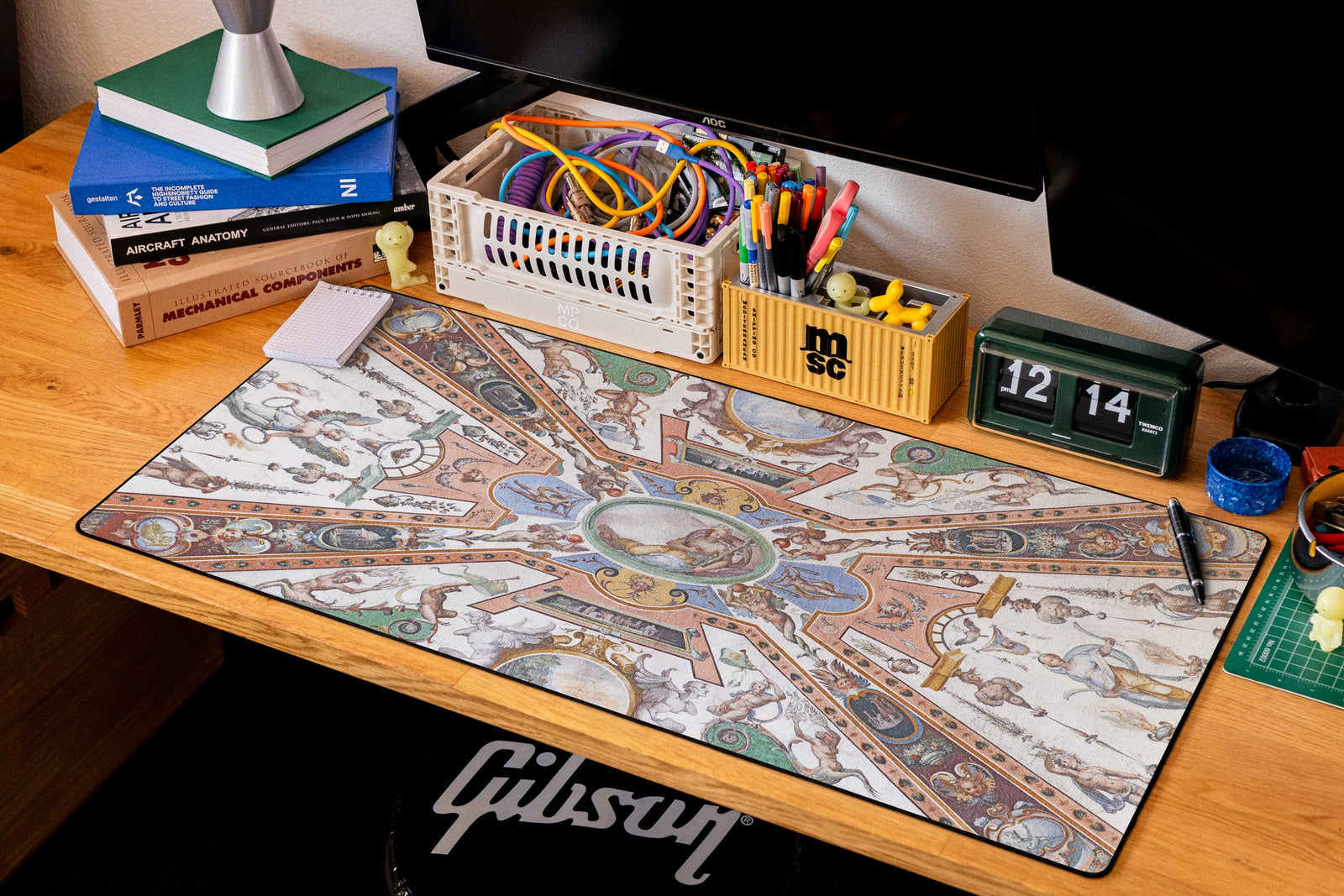 Reclining Allegory desk mat in Original, shown on a styled desk setup