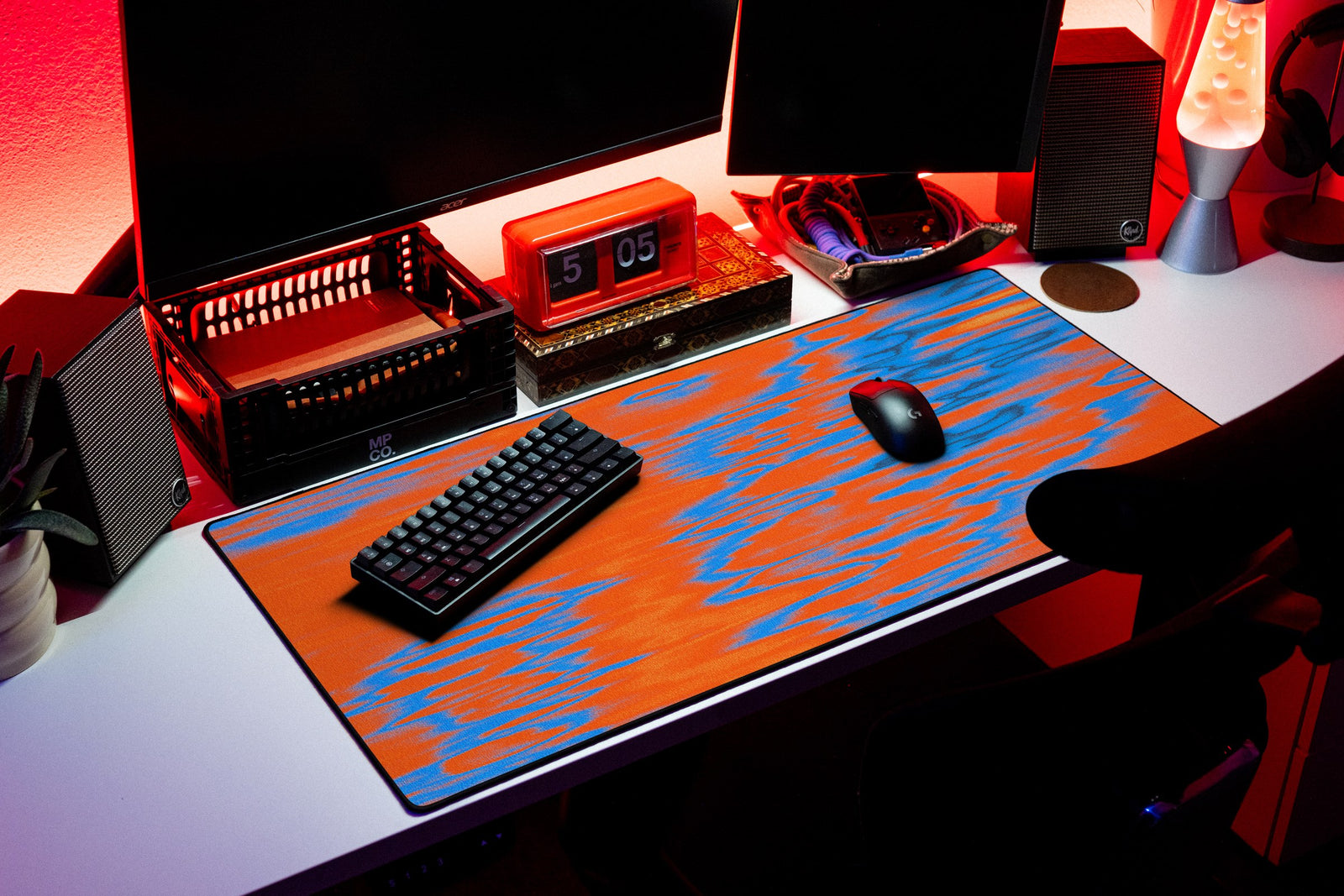 River desk mat in Ember Ripple, shown on a styled desk setup