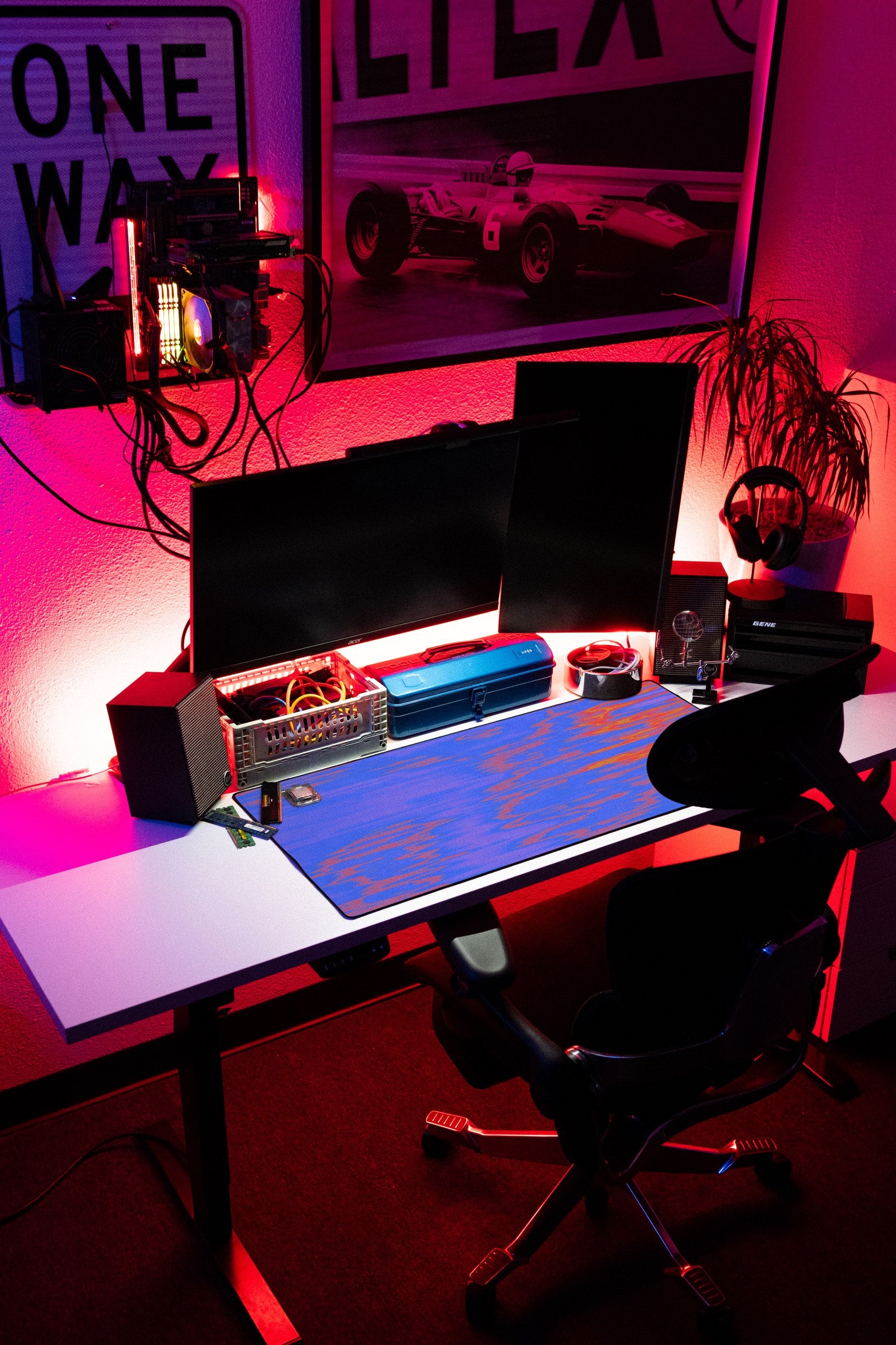 River desk mat in Neon Ripple, shown on a styled desk setup