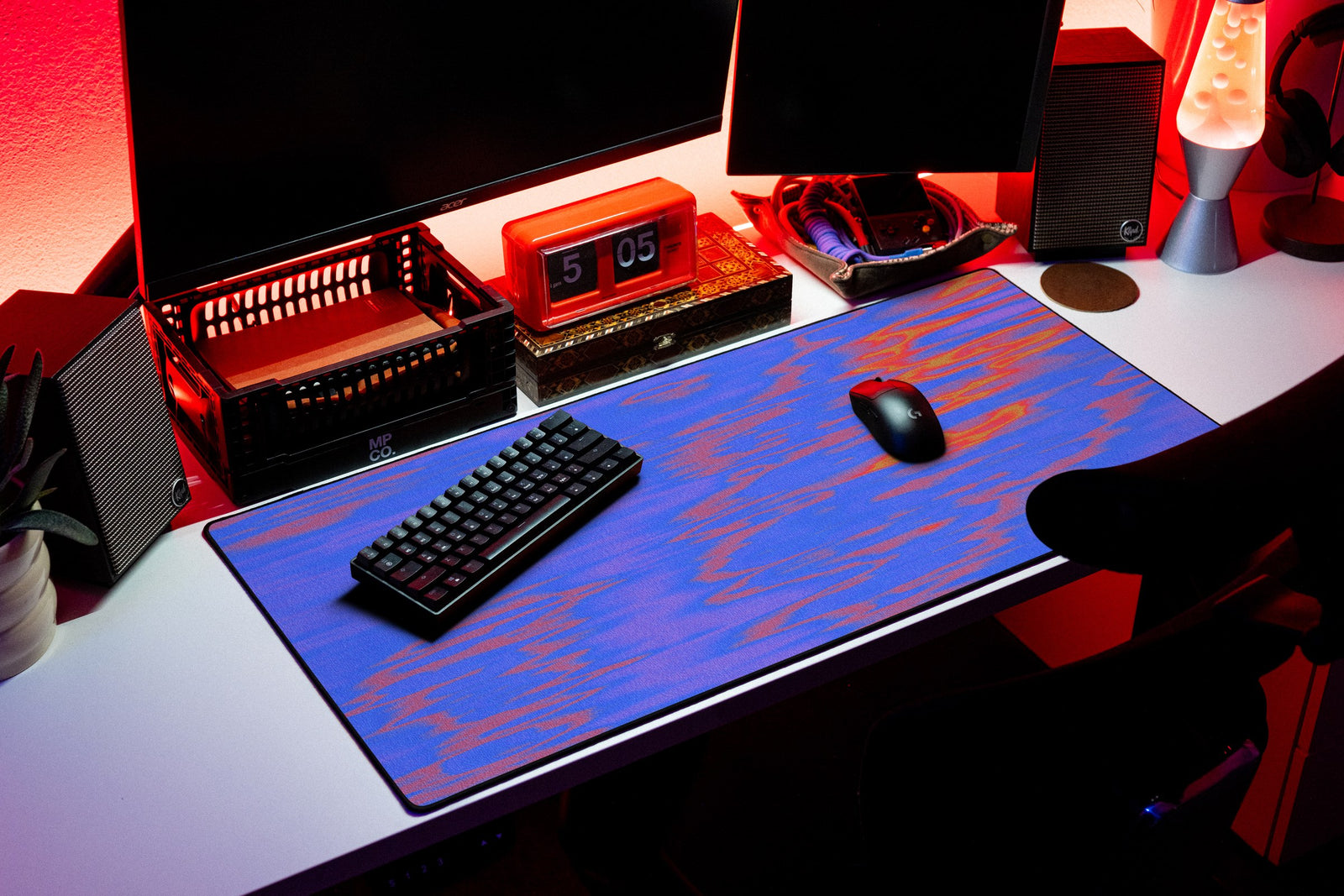 River desk mat in Neon Ripple, shown on a styled desk setup