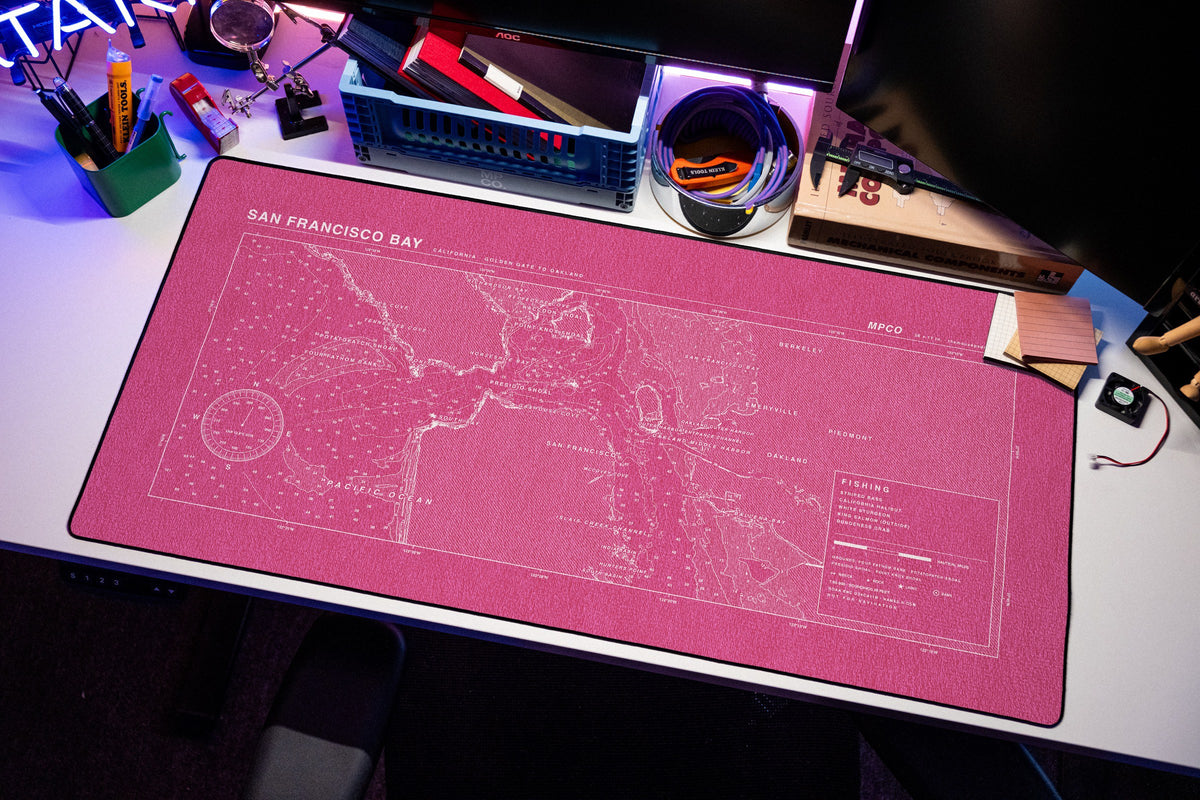 San Francisco Bay Nautical Chart Pad desk mat in Pink / White, shown on a styled desk setup