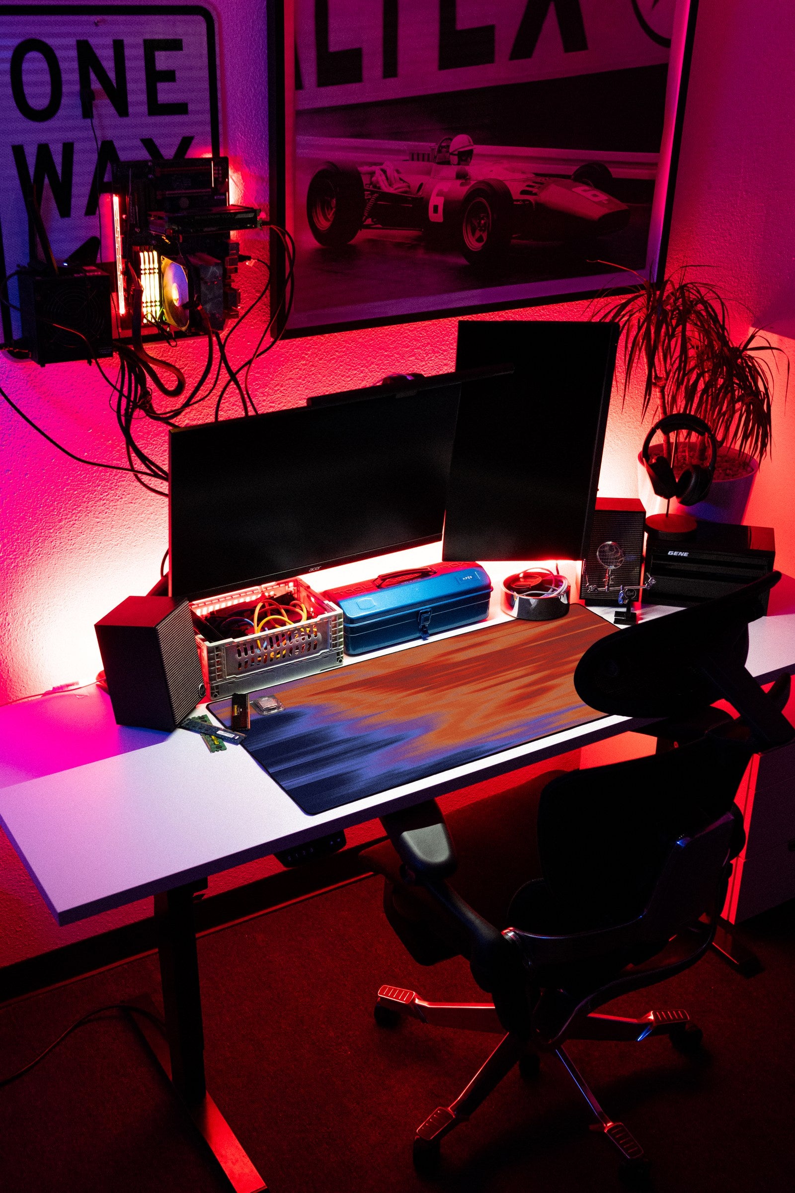 Signal desk mat in Fire Noise, shown on a styled desk setup