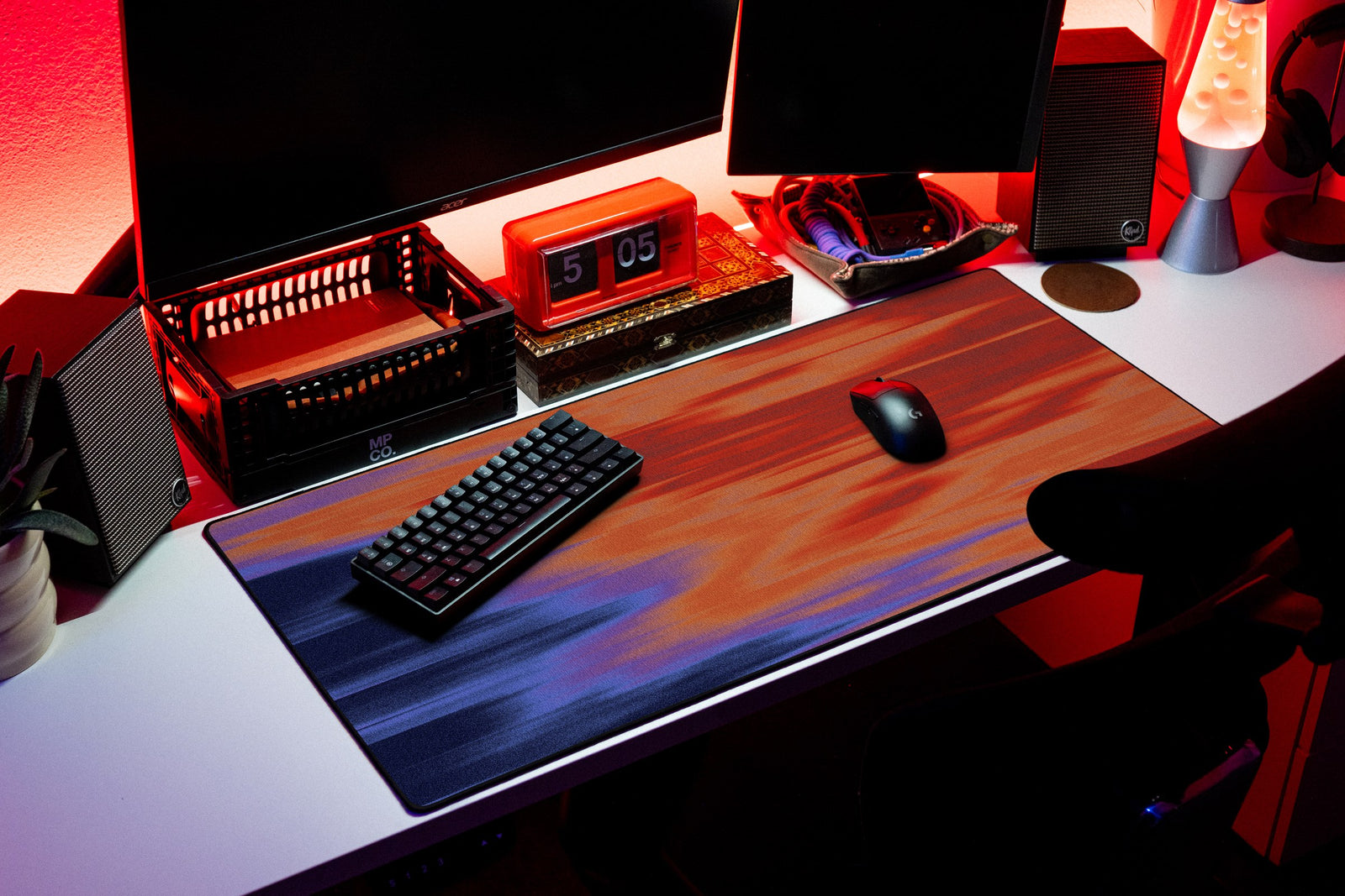 Signal desk mat in Fire Noise, shown on a styled desk setup