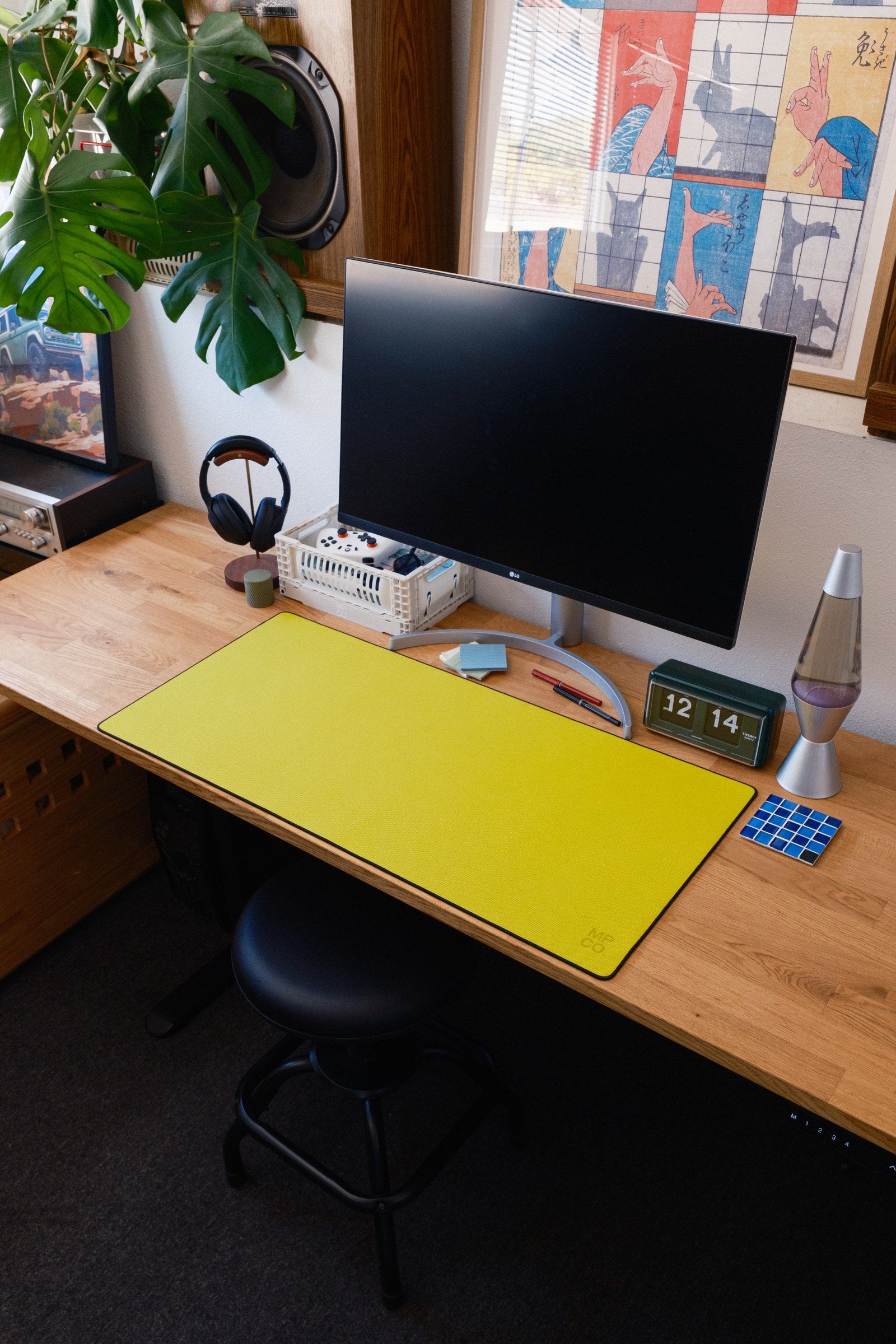 Solid Colors 2026 Summer desk mat in Lemon, shown on a styled desk setup