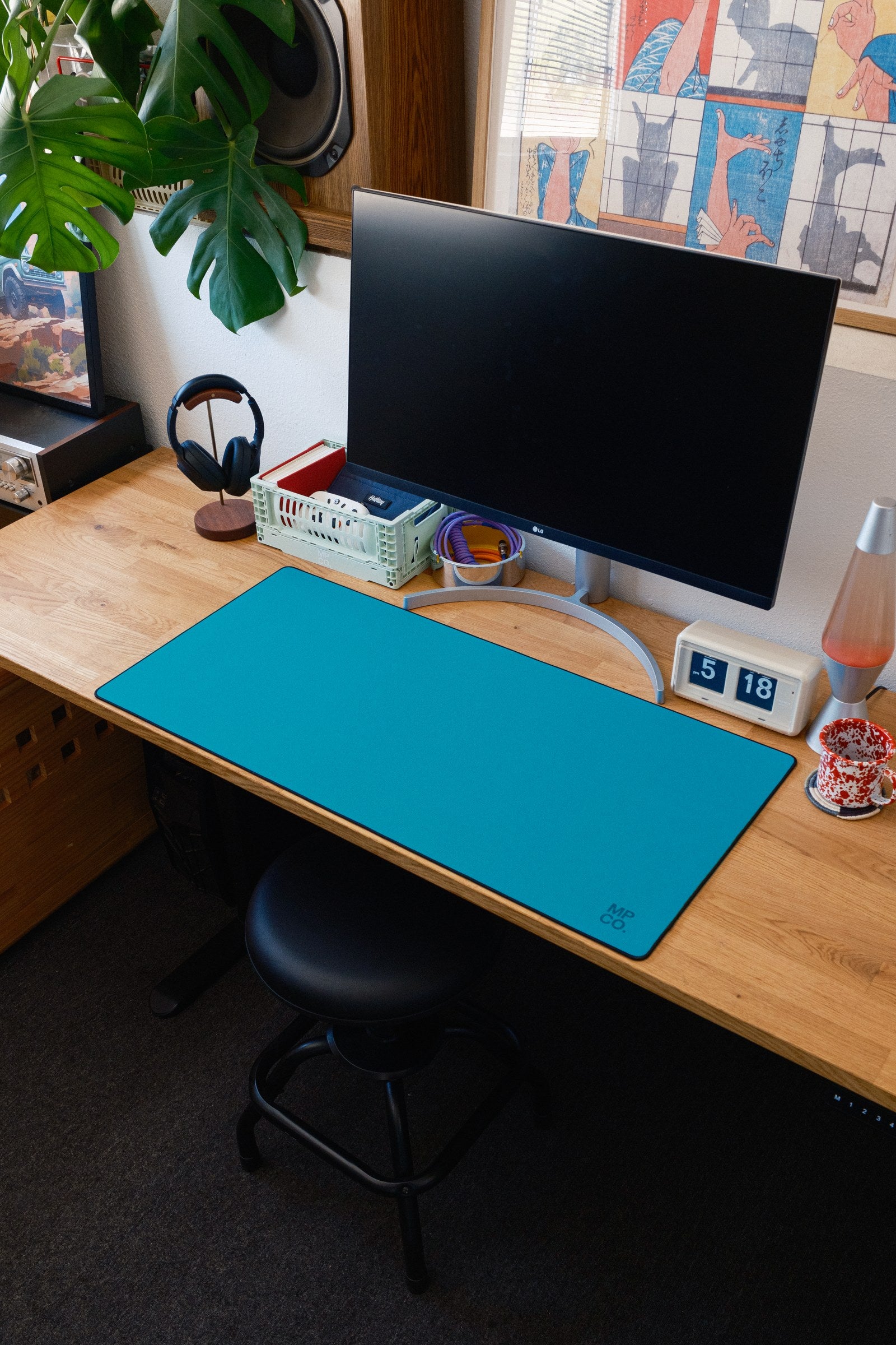 Solid Colors 2026 Summer desk mat in Teal, shown on a styled desk setup