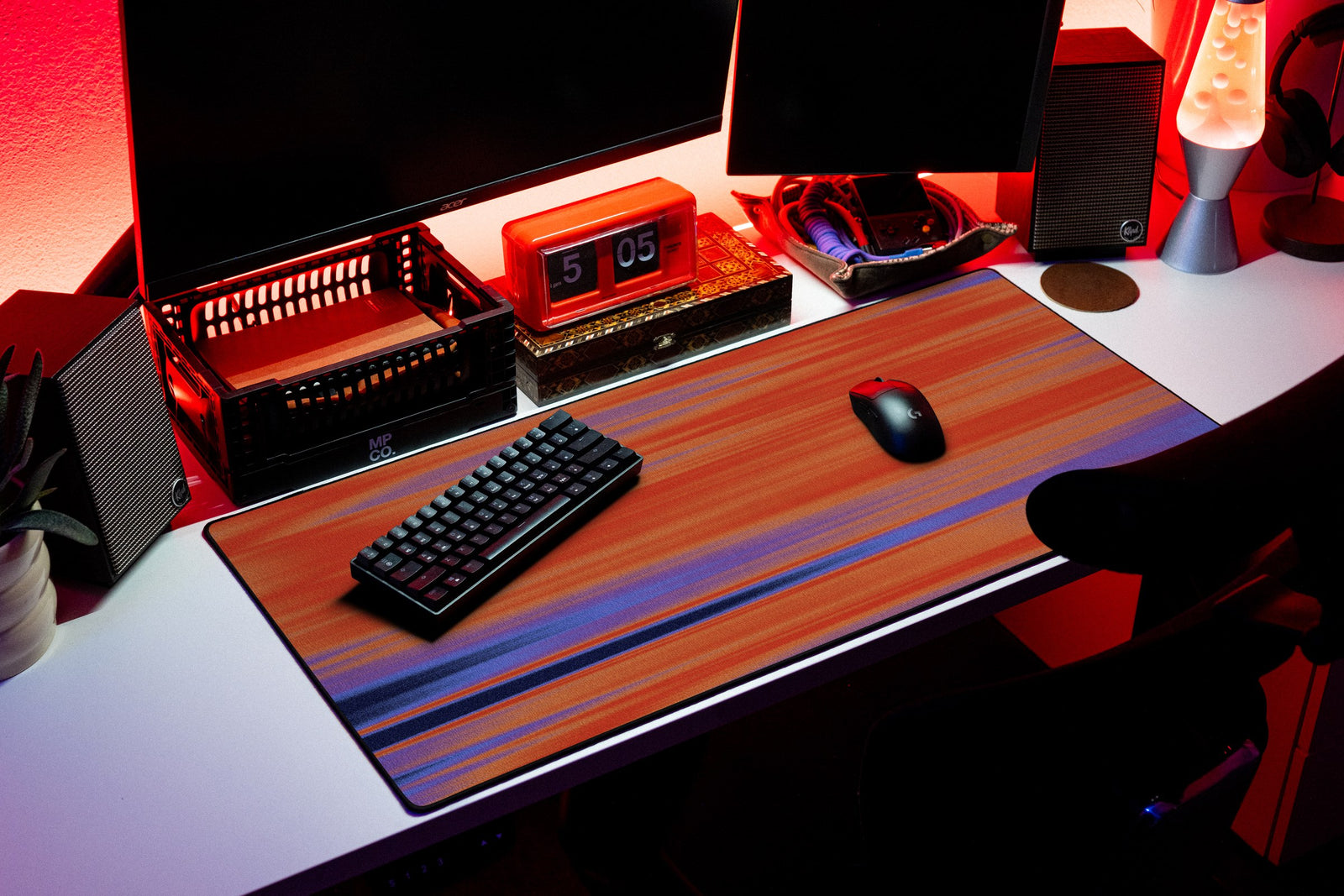 Speed desk mat in Copper Blur, shown on a styled desk setup