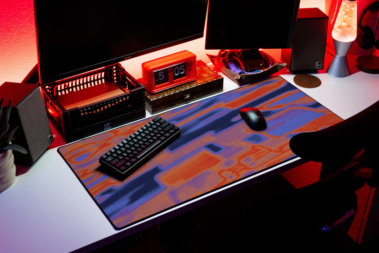Square desk mat in Magenta Warp, shown on a styled desk setup