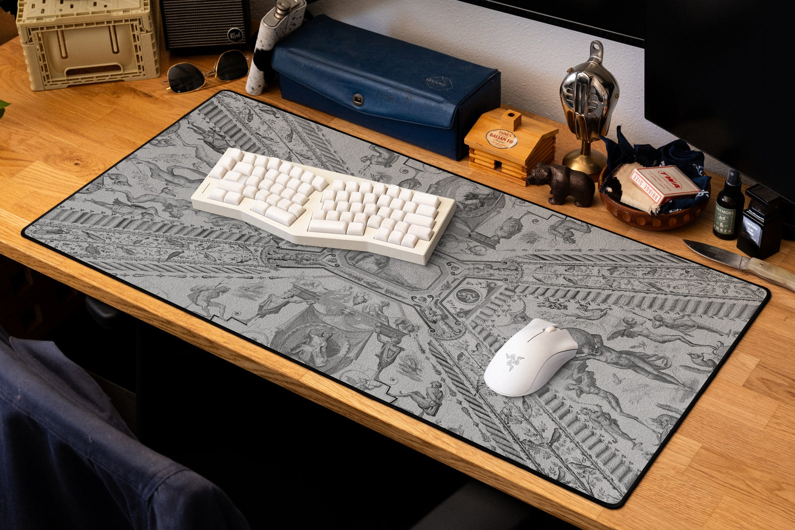 Twin Globes desk mat in Dark, shown on a styled desk setup