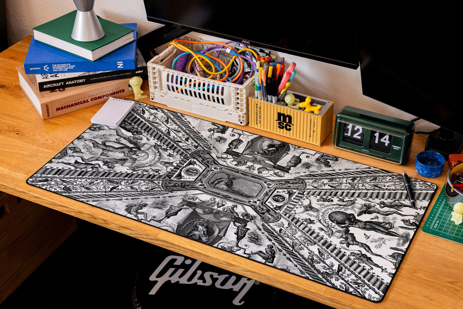 Twin Globes desk mat in Dither, shown on a styled desk setup