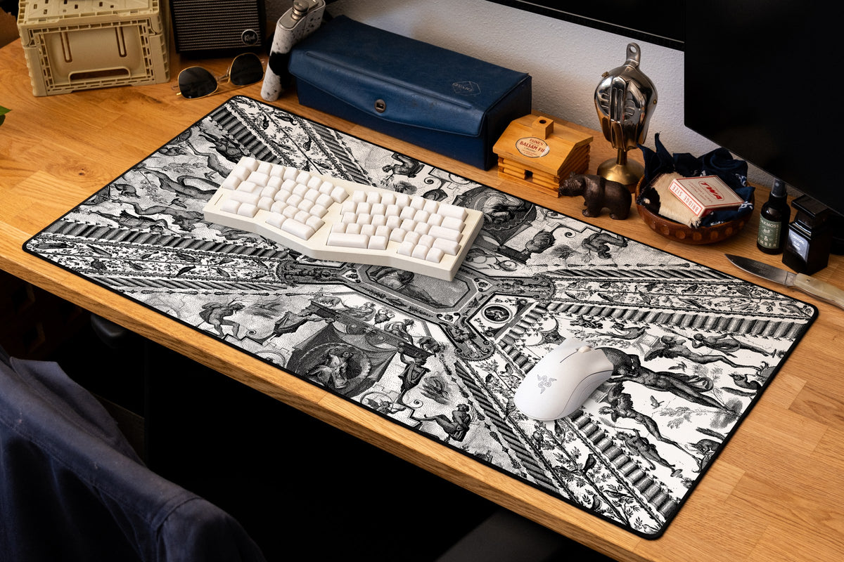 Twin Globes desk mat in Dither, shown on a styled desk setup