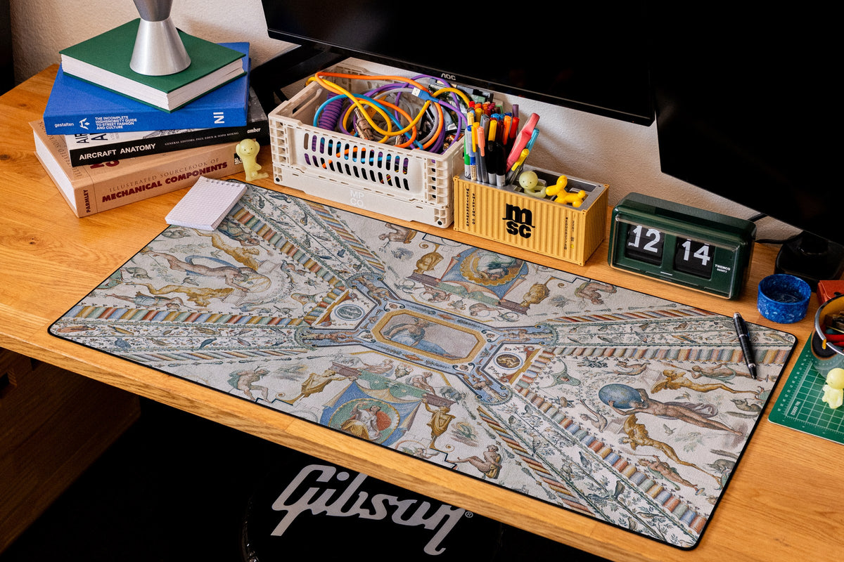 Twin Globes desk mat in Original, shown on a styled desk setup