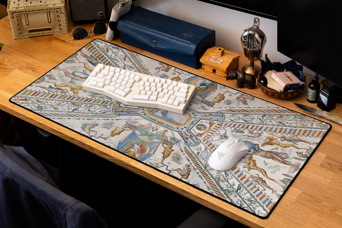 Twin Globes desk mat in Original, shown on a styled desk setup