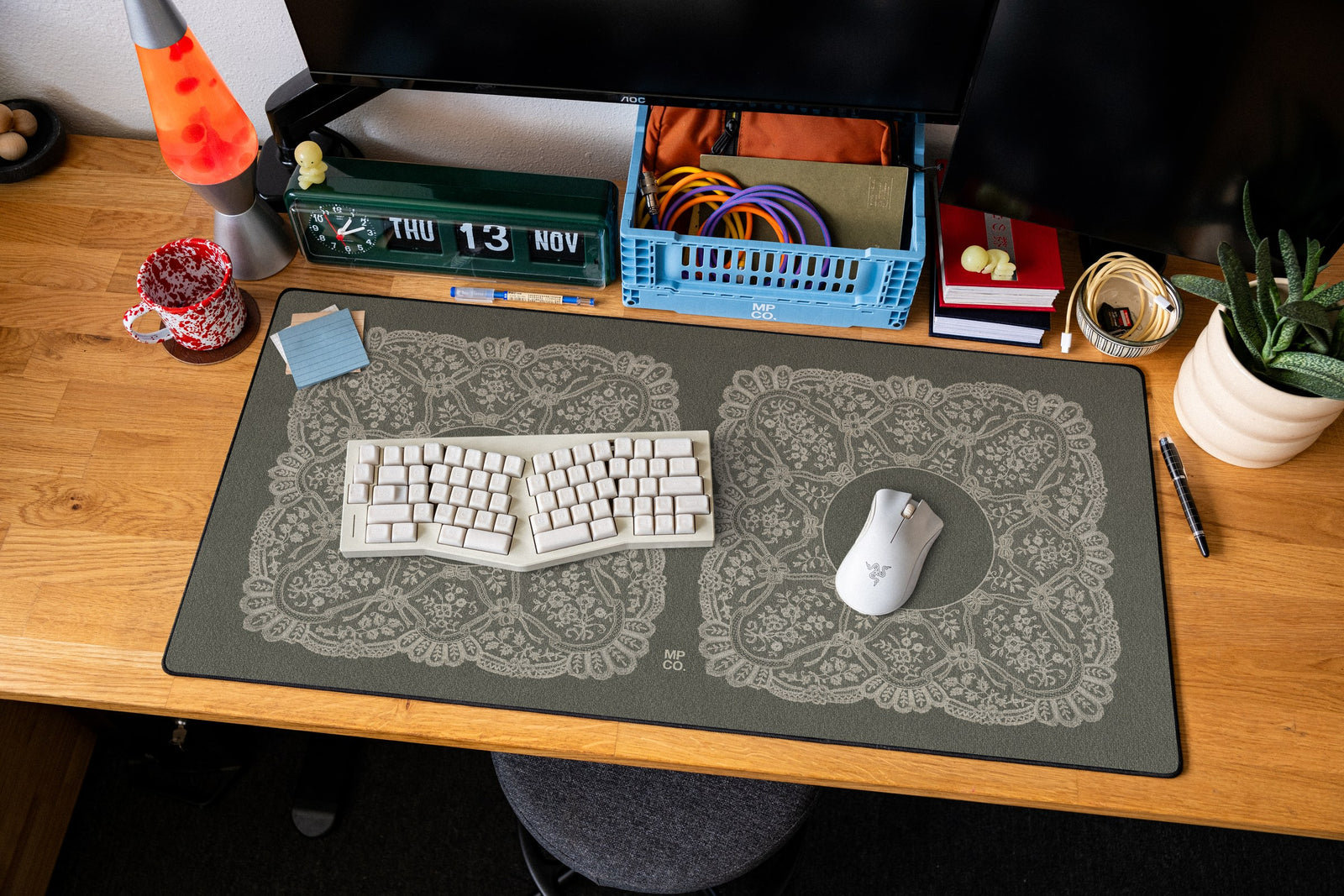 Twin Veil desk mat in Olive, shown on a styled desk setup